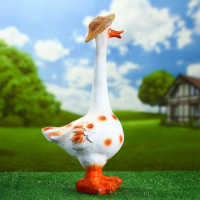 Садовая фигура "Гусь в шляпе малый" 51х25 см Садовая фигура "Гусь в шляпе малый" 51х25 см