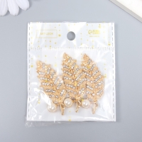 Декор для творчества металл, пластик "Листик с жемчужинкой и стразами" золото 5,5х2,2 см Декор для творчества металл, пластик "Листик с жемчужинкой и стразами" золото 5,5х2,2 см