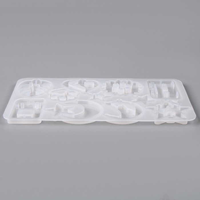 Форма силиконовая универсальная для создания сережек, кулонов, брелков - 12 шт. Форма силиконовая универсальная для создания сережек, кулонов, брелков - 12 шт.