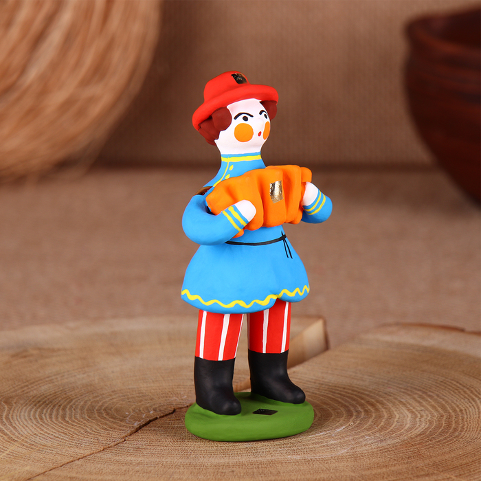 Дымковская игрушка Дымковская игрушка "Мужик стоячий с гармошкой"