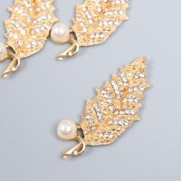 Декор для творчества металл, пластик "Листик с жемчужинкой и стразами" золото 5,5х2,2 см Декор для творчества металл, пластик "Листик с жемчужинкой и стразами" золото 5,5х2,2 см