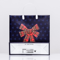 Новый год. Подарочный пакет "Бантик на синем", мягкий пластик, 30 x 30 см, 120 мкм