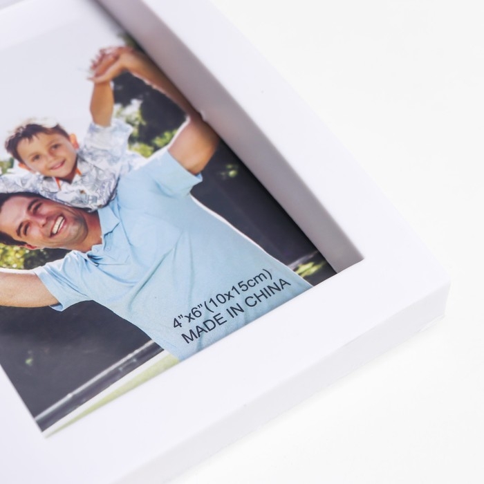 Фоторамка пластик на 6 фото 10х15 см Фоторамка пластик на 6 фото 10х15 см "Выгнутая" белая 29,5х46 см