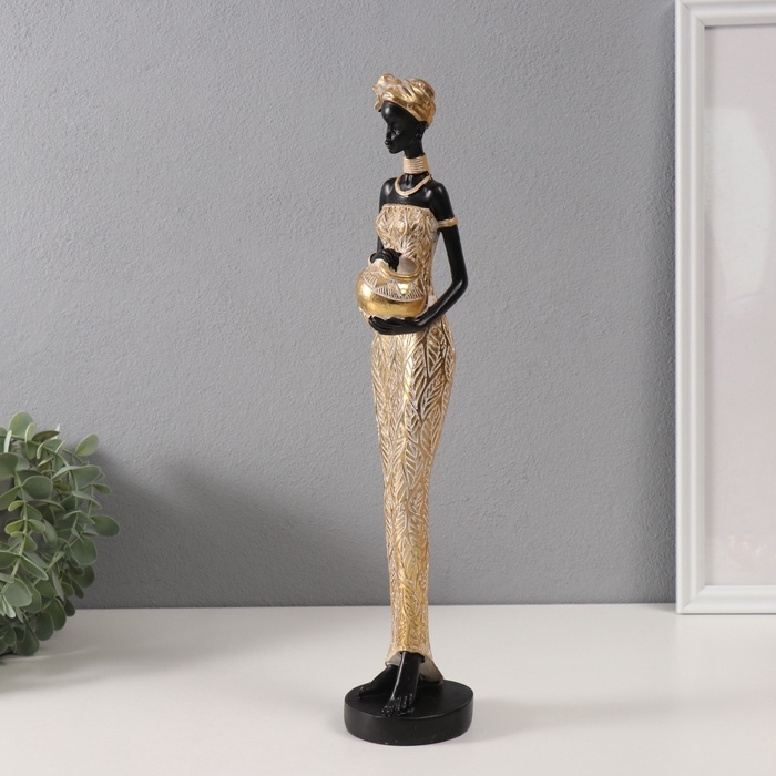 Сувенир полистоун "Африканка в платье с листьями, с горшком" золото 8,5х8х39 см