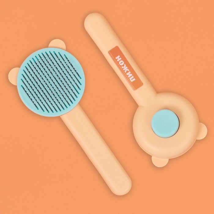 Пуходёрка пластиковая Пуходёрка пластиковая "Кошка" с функцией самоочистки, 8,5 х 20 см, оранжевая