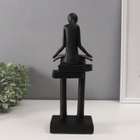 Сувенир полистоун "Абстракция. Человек сидит на книгах читает" черный с серебром 7,5х11х30см