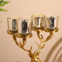 Подсвечник на 4 свечи "Олень" алюминий 18х20х35 см Подсвечник на 4 свечи "Олень" алюминий 18х20х35 см