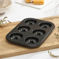 Форма для выпечки Доляна «Пончики», 26,5×17 см, 6 ячеек, антипригарное покрытие, цвет чёрный Форма для выпечки Доляна «Пончики», 26,5×17 см, 6 ячеек, антипригарное покрытие, цвет чёрный