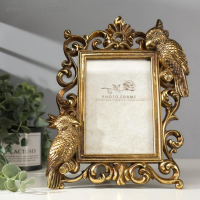 Фоторамка полистоун 10х15 см "Попугаи" состаренное золото 26,5х20,5 см Фоторамка полистоун 10х15 см "Попугаи" состаренное золото 26,5х20,5 см