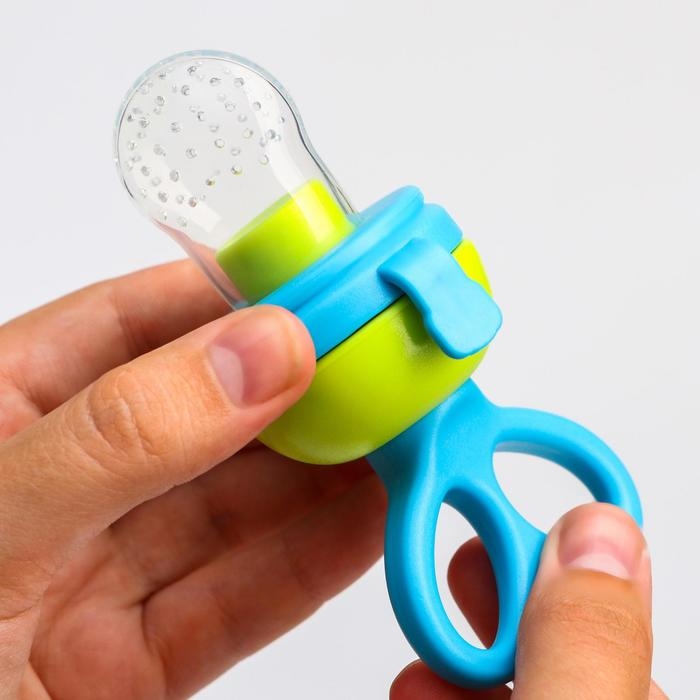 Ниблер с силиконовой сеточкой, вращающийся поршень, цвет голубой Ниблер с силиконовой сеточкой, вращающийся поршень, цвет голубой