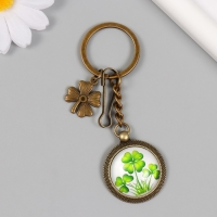 Брелок металл, стекло с карабином "Клевер в медальоне" бронза 9,5 см Брелок металл, стекло с карабином "Клевер в медальоне" бронза 9,5 см