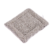 Игрушка на панель авто, собака на подушке, бело-черный окрас Игрушка на панель авто, собака на подушке, бело-черный окрас