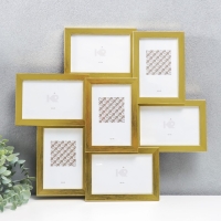 Фоторамка пластик на 7 фото "KRUZO", цв. золотой Фоторамка пластик на 7 фото "KRUZO", цв. золотой