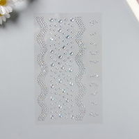 Наклейка пластик стразы "Река" серебро 22,5х11,5 см Наклейка пластик стразы "Река" серебро 22,5х11,5 см