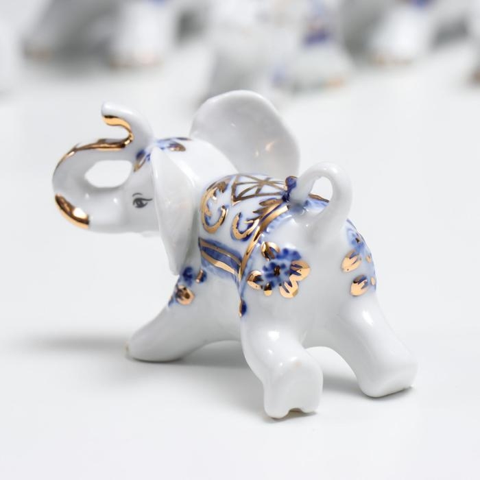 Сувенир керамика Сувенир керамика "Слоны с синей росписью" набор 7 шт h= 11 см 31,5х23,5 см