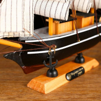 Корабль сувенирный малый «Ковда», борта чёрные с белыми полосами, паруса белые, 5,5×24×22 см Корабль сувенирный малый «Ковда», борта чёрные с белыми полосами, паруса белые, 5,5×24×22 см