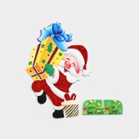 Декоративное украшение (подставка) "Дед мороз с подарком" 9х14,5 см Декоративное украшение (подставка) "Дед мороз с подарком" 9х14,5 см