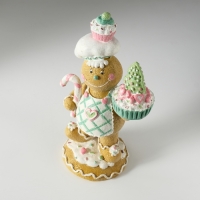 Сувенир полистоун "Пряничка кондитер со сладостями" 13х9х23,5 см