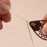 Нитковдеватель ажурный 6*2,8см бронзовый ТР