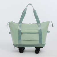 Сумка дорожная на колёсах, с увеличением, наружный карман, держатель для чемодана, цвет зелёный Сумка дорожная на колёсах, с увеличением, наружный карман, держатель для чемодана, цвет зелёный