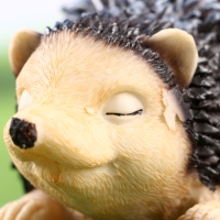 Садовая фигура "Ежик греется" 18х10х10см Садовая фигура "Ежик греется" 18х10х10см