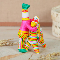 Филимоновская игрушка «Папа учит сына» Филимоновская игрушка «Папа учит сына»