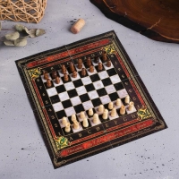 Винный набор: нож-сомелье со штопором, каплеуловитель, нож для фольги и пробка для вина с шахматами &laquo;Золотому человеку&raquo;.