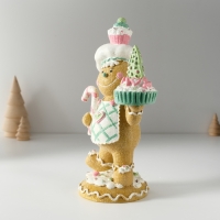 Сувенир полистоун "Пряничка кондитер со сладостями" 13х9х23,5 см