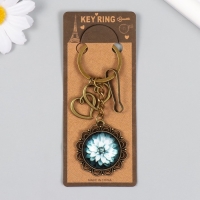 Брелок металл, стекло с карабином "Двойное сердце и цветок в медальоне" бронза 9,5 см Брелок металл, стекло с карабином "Двойное сердце и цветок в медальоне" бронза 9,5 см