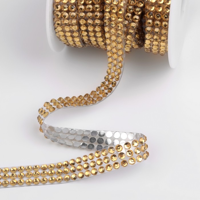 Стразы термоклеевые, d = 4 мм, ширина - 10 мм, 4,5 &plusmn; 0,5 м, цвет золотой