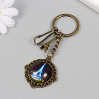 Брелок металл, стекло с карабином "Эйфелева башня и медальон" бронза 9,5 см Брелок металл, стекло с карабином "Эйфелева башня и медальон" бронза 9,5 см