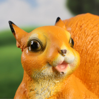 Садовая фигура "Белочка с орешком на пне" 25х12х23см Садовая фигура "Белочка с орешком на пне" 25х12х23см