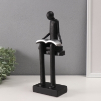 Сувенир полистоун "Абстракция. Человек сидит на книгах читает" черный с серебром 7,5х11х30см