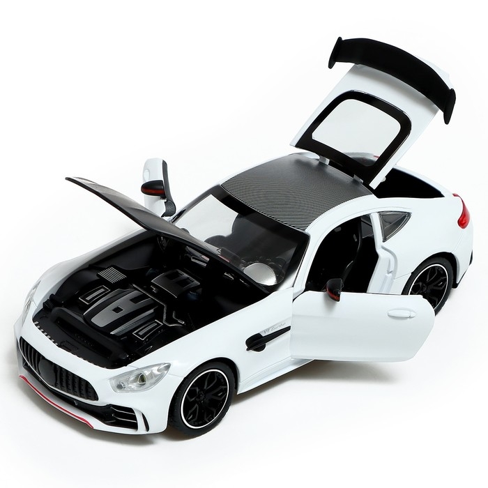 Машина металлическая, 1:24, инерционная, открываются двери, капот, багажник, цвет белый Машина металлическая, 1:24, инерционная, открываются двери, капот, багажник, цвет белый