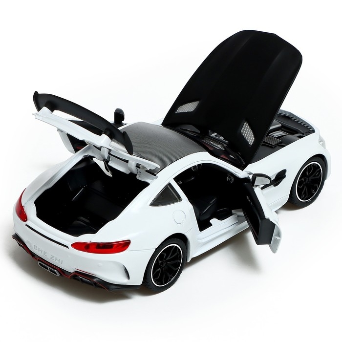 Машина металлическая, 1:24, инерционная, открываются двери, капот, багажник, цвет белый Машина металлическая, 1:24, инерционная, открываются двери, капот, багажник, цвет белый