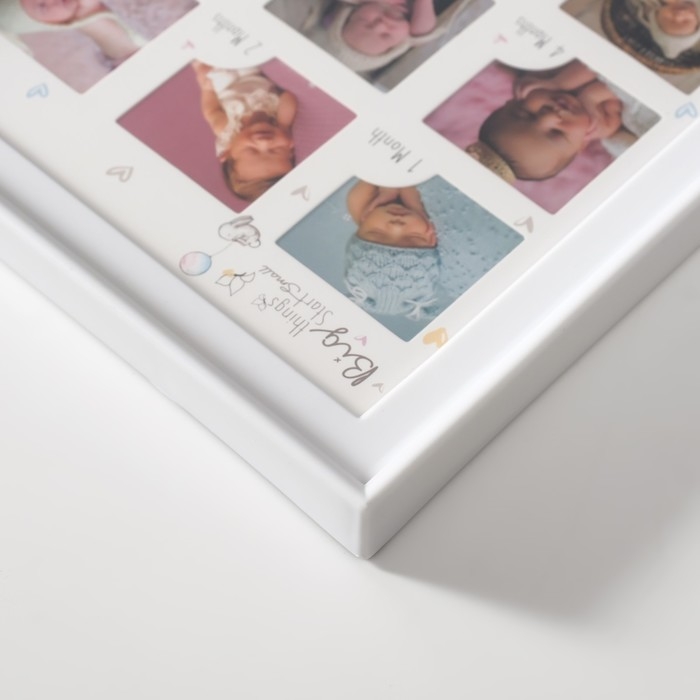 Фоторамка на 12 фото 4х4 см с штемп.подушкой Фоторамка на 12 фото 4х4 см с штемп.подушкой "Сделано с любовью" белая 2х36х23 см