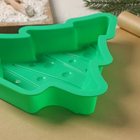 Форма для выпечки Доляна «Ёлочка с гирляндой», силикон, 27×25 см, цвет зелёный Форма для выпечки Доляна «Ёлочка с гирляндой», силикон, 27×25 см, цвет зелёный