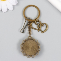 Брелок металл, стекло с карабином "Двойное сердце и цветок в медальоне" бронза 9,5 см Брелок металл, стекло с карабином "Двойное сердце и цветок в медальоне" бронза 9,5 см