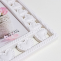 Фоторамка пластик 10х15 см "Сердечность" белая 22,5х17 см Фоторамка пластик 10х15 см "Сердечность" белая 22,5х17 см