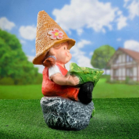 Садовая фигура "Девочка на камне с листом" 48х29см Садовая фигура "Девочка на камне с листом" 48х29см